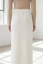 Model wearing Nuggles® 36" Classic Skirt in Off White