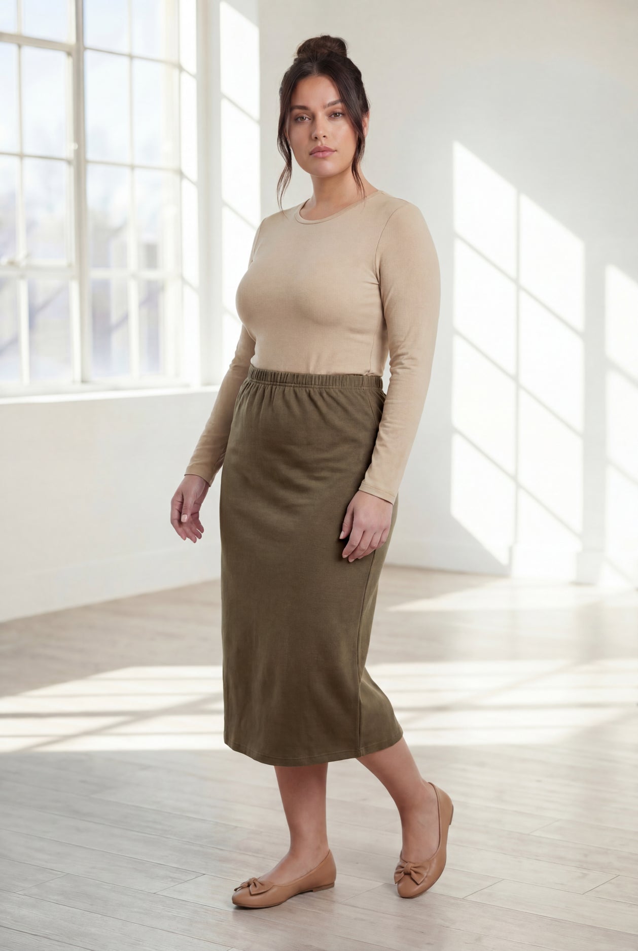 Model wearing Nuggles®  31" Classic Skirt in Olive Brown
