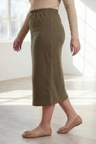 Model wearing Nuggles®  31" Classic Skirt in Olive Brown
