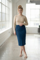 Model wearing Nuggles® 27" Classic Skirt in  Peacock Blue