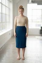 Model wearing Nuggles® 27" Classic Skirt in  Peacock Blue