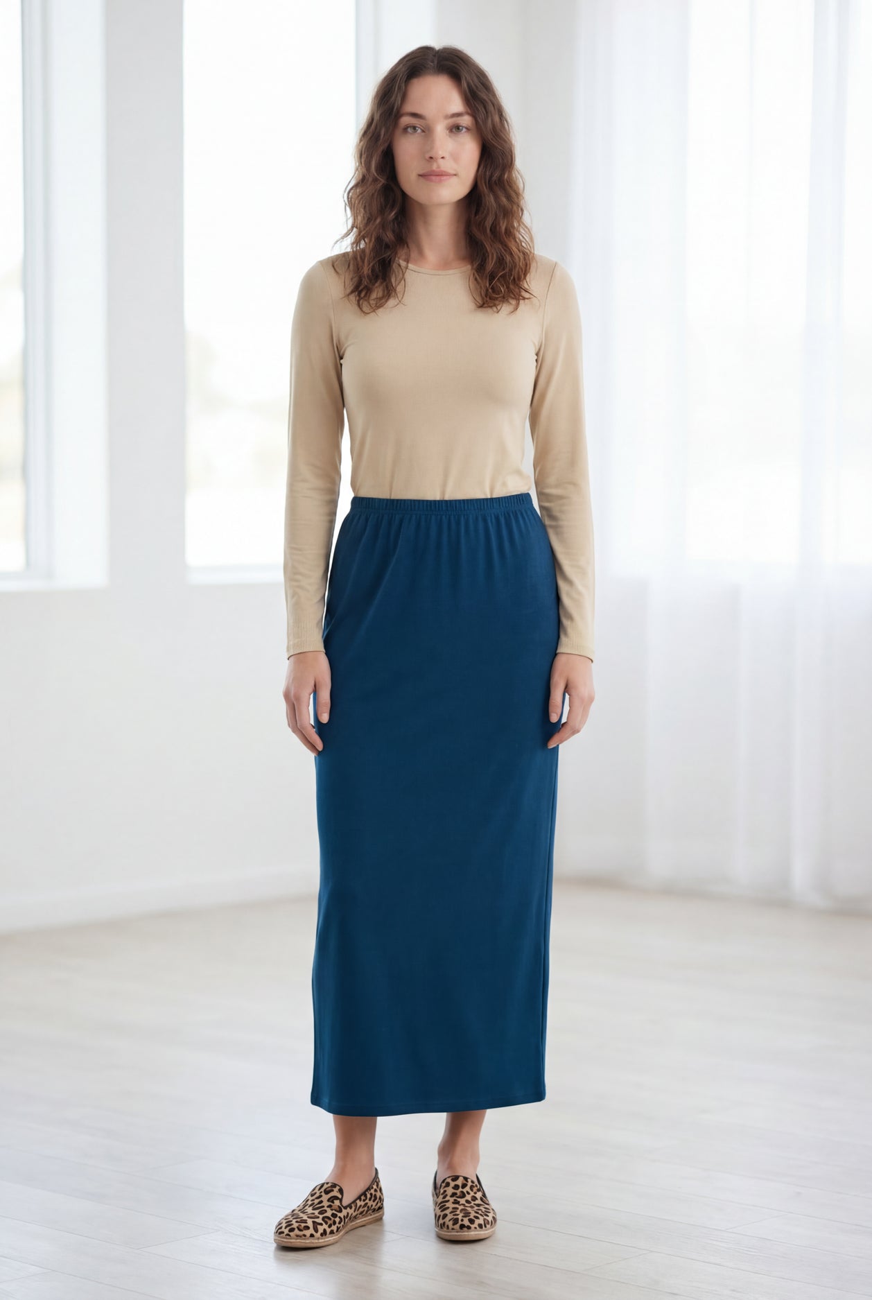 Model wearing Nuggles® 36" Classic Skirt in Peacock