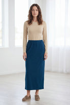 Model wearing Nuggles® 36" Classic Skirt in Peacock