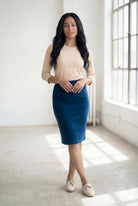 Model wearing Nuggles® 25" Classic Skirt in  Peacock Blue