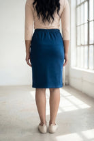 Model wearing Nuggles® 25" Classic Skirt in  Peacock Blue