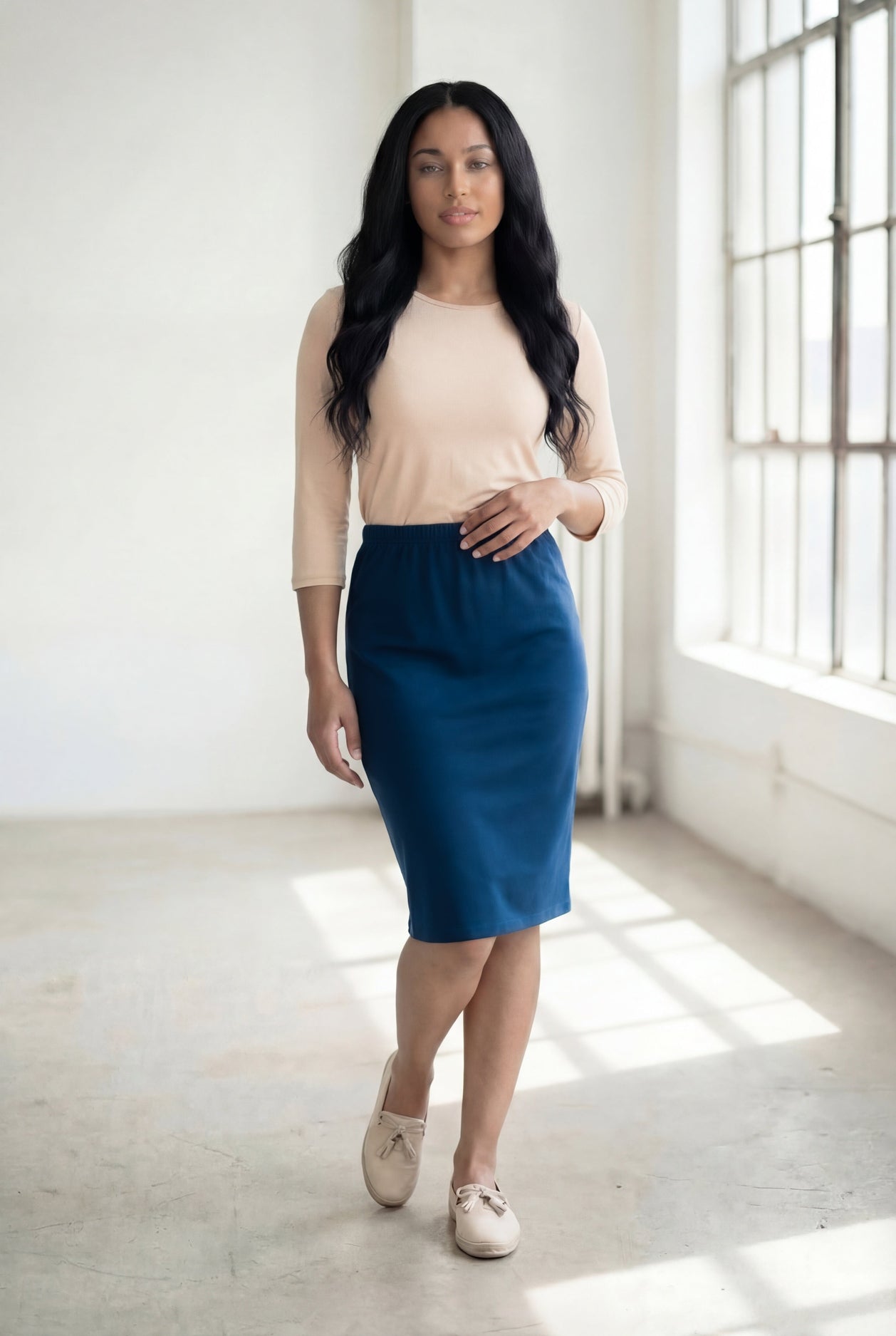 Model wearing Nuggles® 25" Classic Skirt in  Peacock Blue