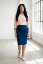 Model wearing Nuggles® 25" Classic Skirt in  Peacock Blue