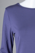 Model wearing Nuggles® 3/4 Essential Tee in Periwinkle Purple