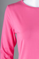 Model wearing Nuggles® 3/4 Essential Tee in Pink