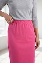 Model wearing Nuggles® 25" Classic Skirt in Pink
