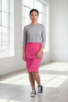 Model wearing Nuggles® 25" Classic Skirt in Pink