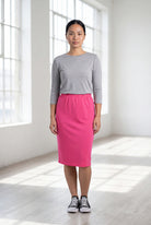 Model wearing Nuggles® 25" Classic Skirt in Pink