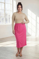Model wearing Nuggles® 31" Classic Skirt in Pink