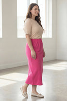 Model wearing Nuggles® 34" Classic Skirt in Pink