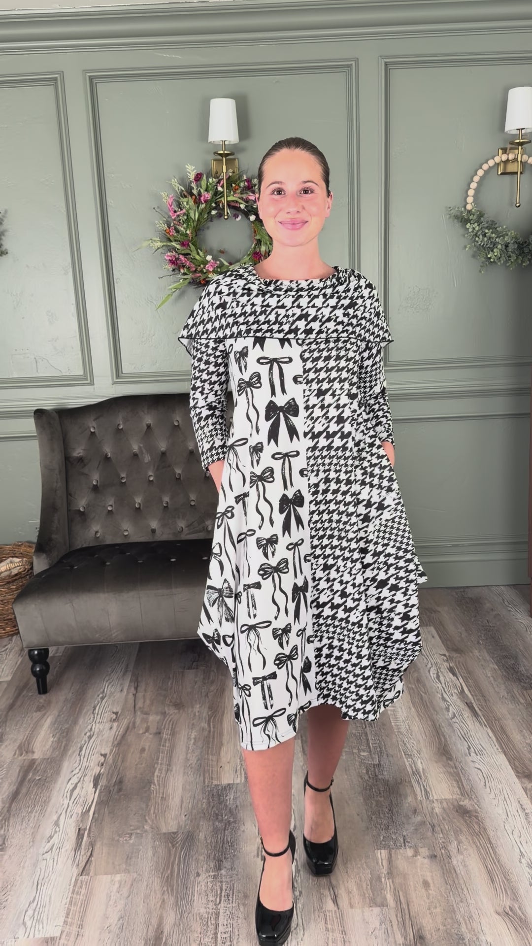 The Nuggles® Bailey Dress try on video a modest midi length, two tone with cowl neckline