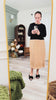 A video showing the fit and features of the Nyla Lined Skirt. It is a pleated fabric with a slip lining inside. 