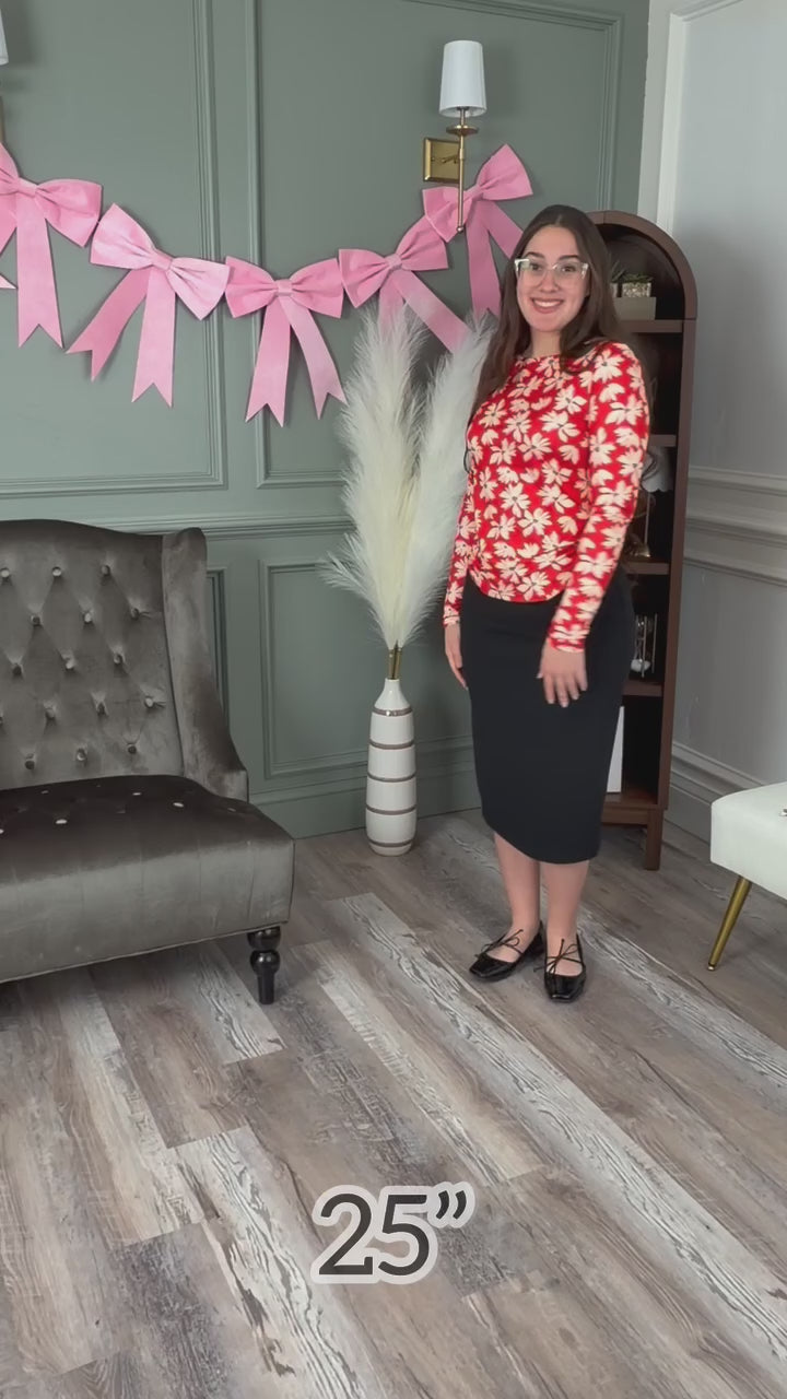 Model showcasing the different lengths in our Classic skirt