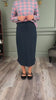 Model trying on the Nuggles® Misty Lounge Skirt, demonstrating its relaxed fit and elastic drawstring waist.
