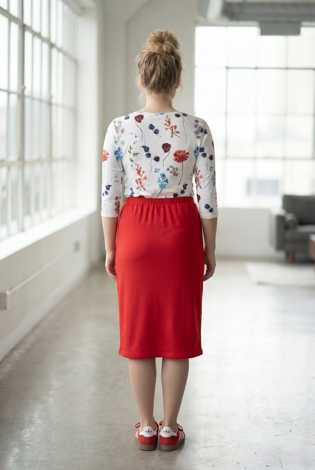 Model wearing Nuggles® 27" Classic Skirt in Red