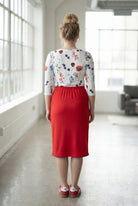 Model wearing Nuggles® 27" Classic Skirt in Red