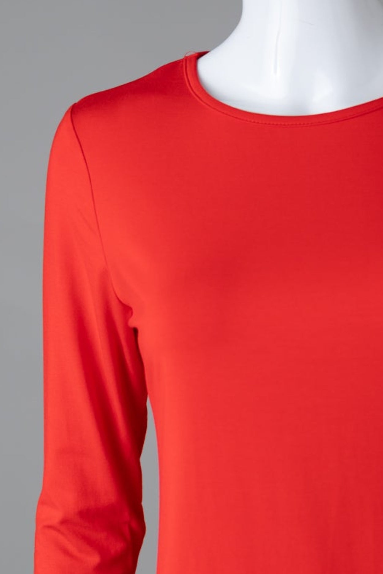 Model wearing Nuggles® 3/4 Essential Tee in Red