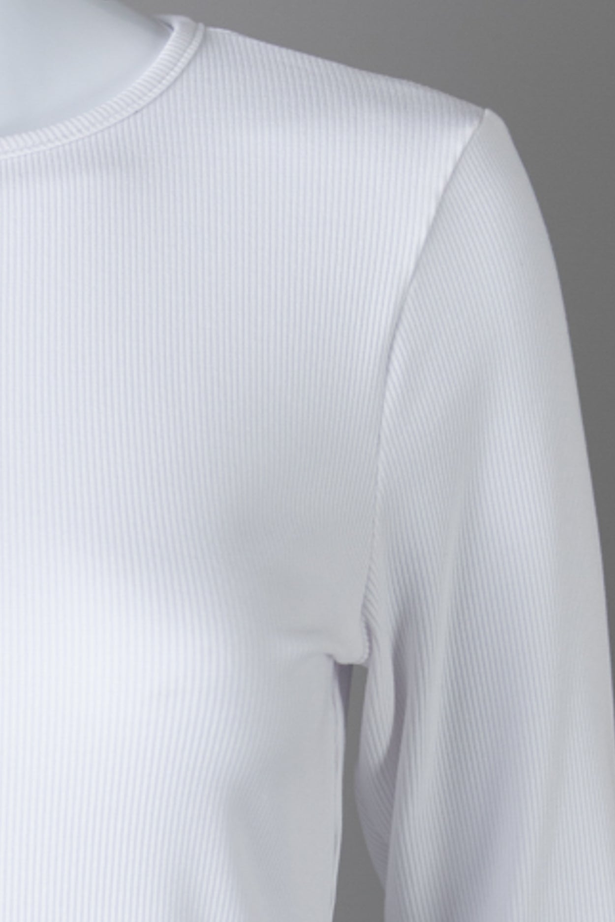 Model wearing Nuggles® 3/4 Essential Ribbed Tee in White