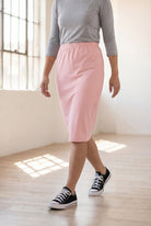 Model wearing Nuggles® 25" Classic Skirt in Rose