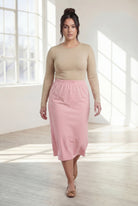 Model wearing Nuggles® 31" Classic Skirt in Rose