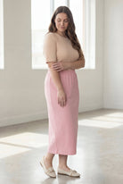 Model wearing Nuggles® 34" Classic Skirt in  Khaki