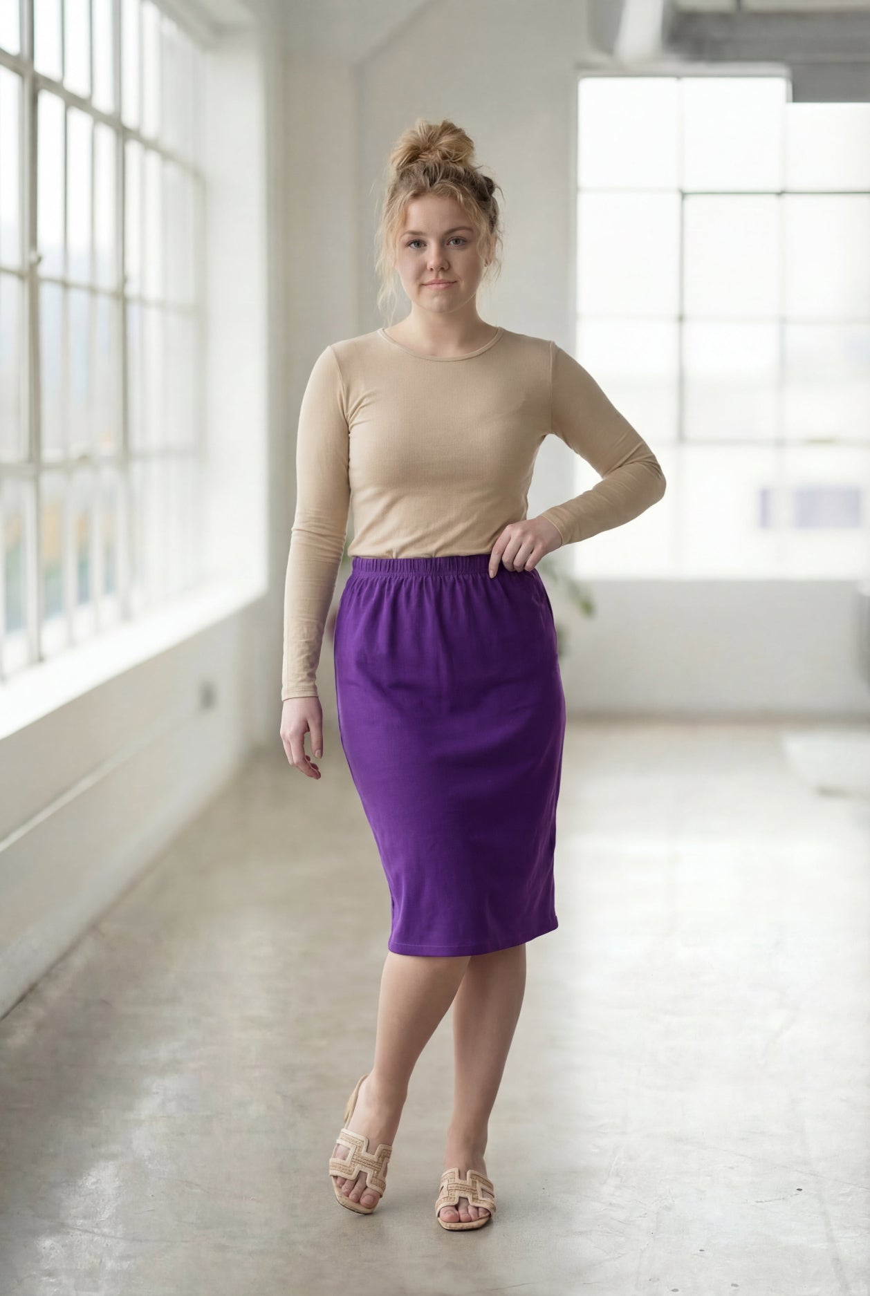 Model wearing Nuggles® 27" Classic Skirt  in Royal Purple