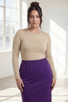 Model wearing Nuggles® 31" Classic Skirt  in Royal Purple