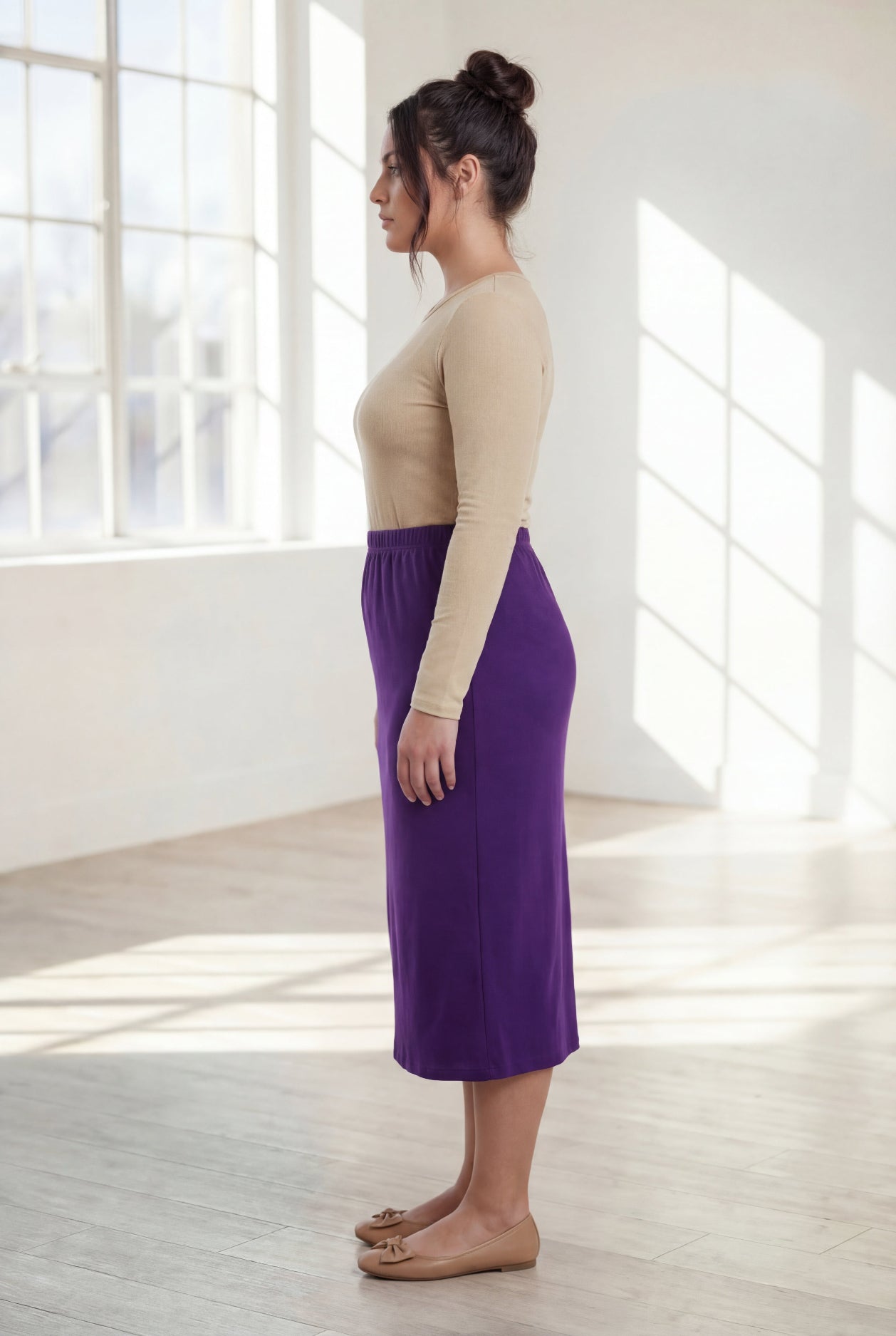 Model wearing Nuggles® 31" Classic Skirt  in Royal Purple