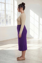 Model wearing Nuggles® 31" Classic Skirt  in Royal Purple