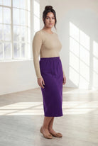 Model wearing Nuggles® 31" Classic Skirt  in Royal Purple