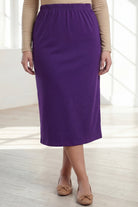 Model wearing Nuggles® 31" Classic Skirt  in Royal Purple