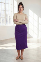 Model wearing Nuggles® 31" Classic Skirt  in Royal Purple