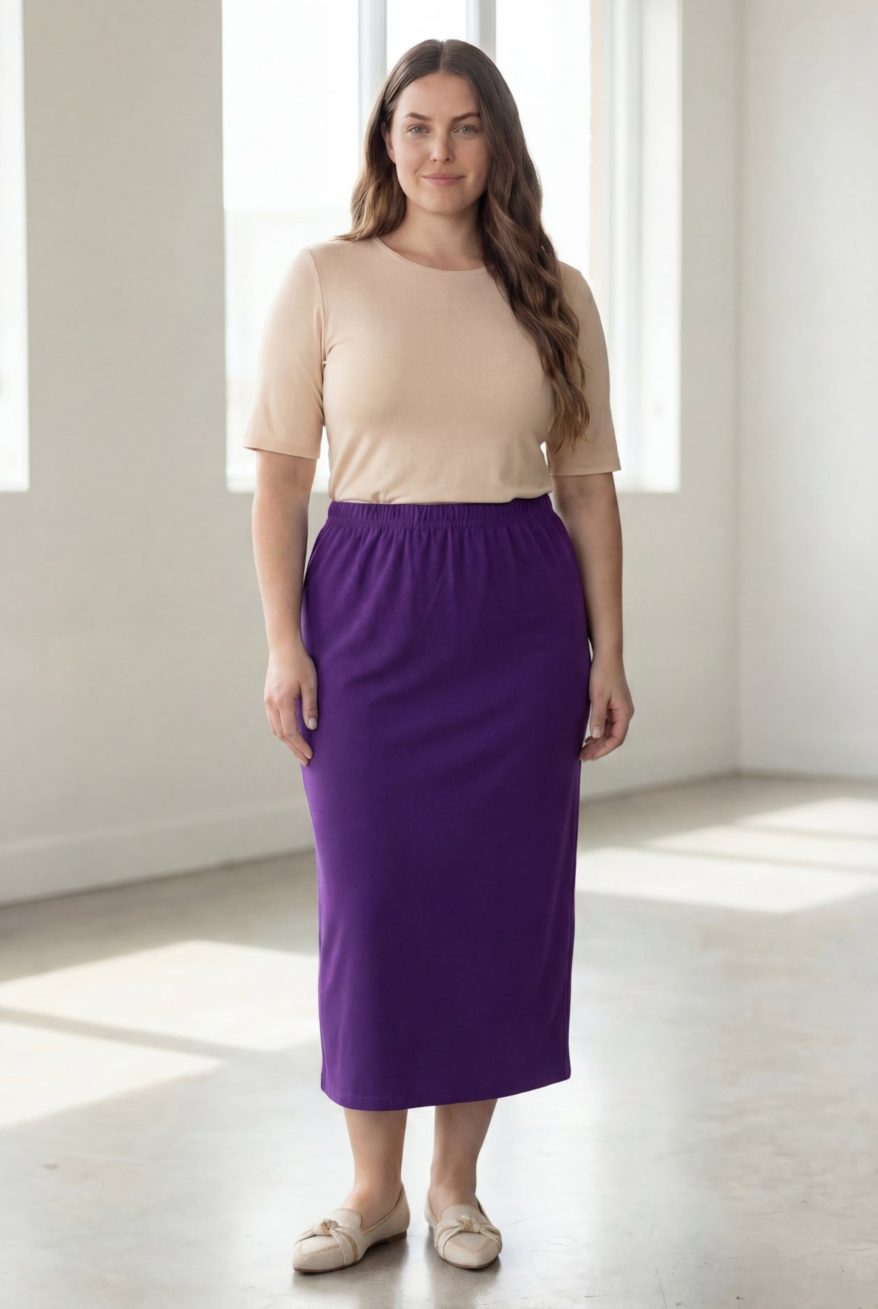 Model wearing Nuggles® 34" Classic Skirt in Royal Purple
