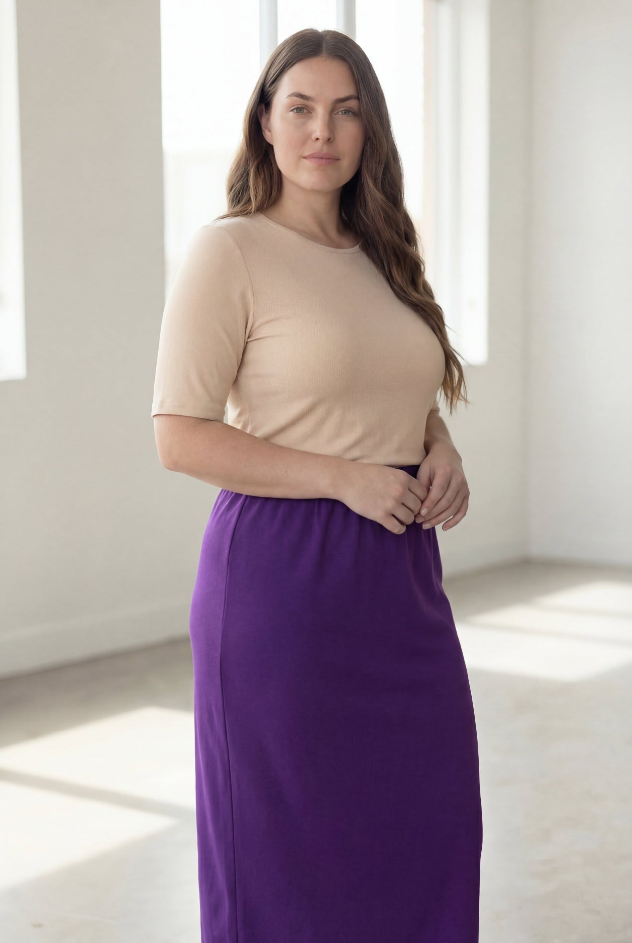 Model wearing Nuggles® 34" Classic Skirt in Royal Purple