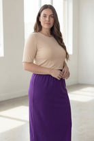 Model wearing Nuggles® 34" Classic Skirt in Royal Purple