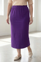 Model wearing Nuggles® 34" Classic Skirt in Royal Purple