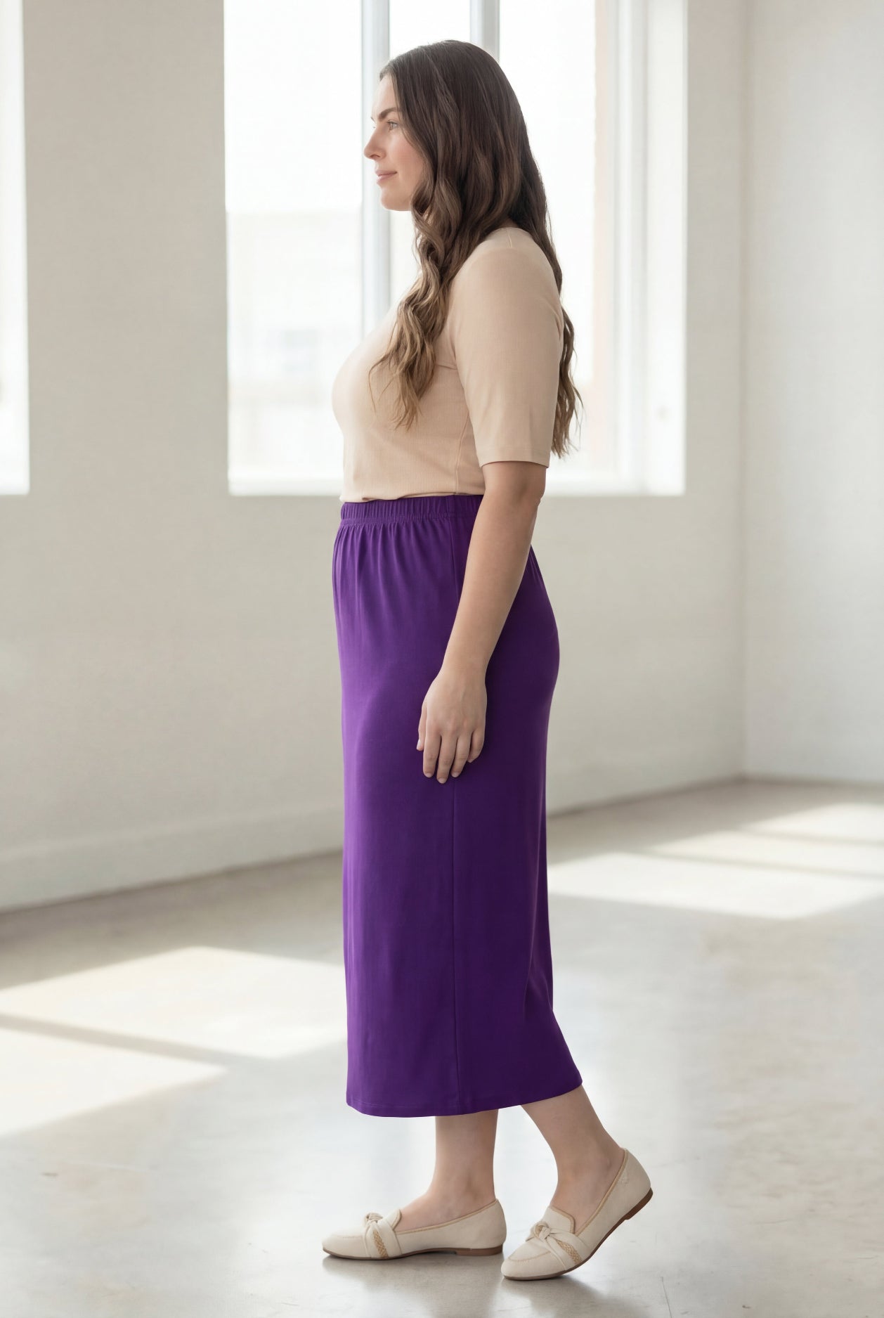Model wearing Nuggles® 34" Classic Skirt in Royal Purple