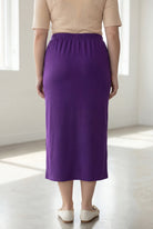 Model wearing Nuggles® 34" Classic Skirt in Royal Purple