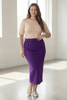 Model wearing Nuggles® 34" Classic Skirt in Royal Purple