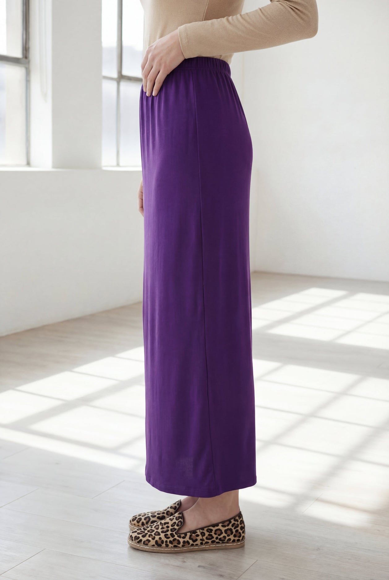 Model wearing Nuggles® 36" Classic Skirt  in Royal Purple