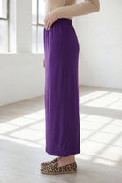 Model wearing Nuggles® 36" Classic Skirt  in Royal Purple