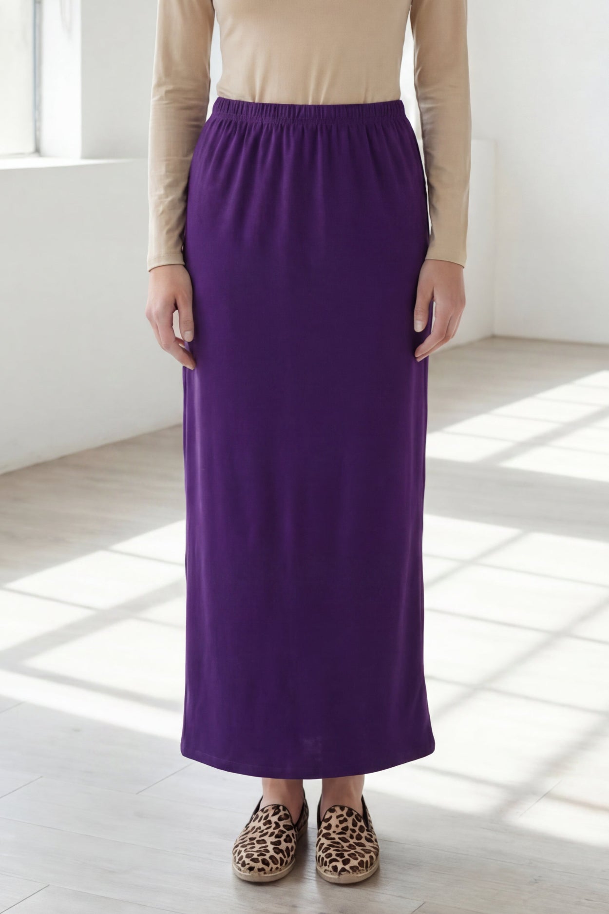 Model wearing Nuggles® 36" Classic Skirt  in Royal Purple