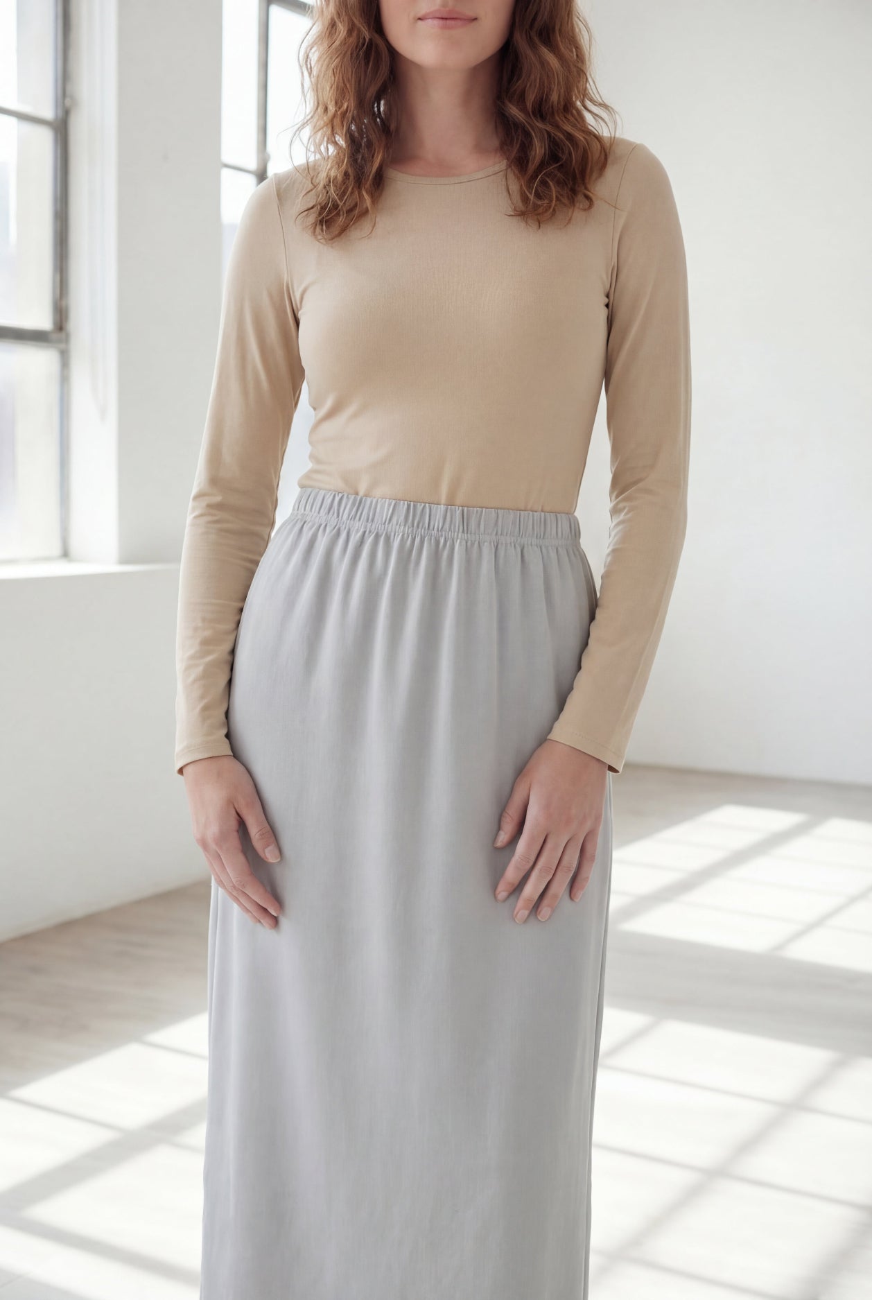 Model wearing Nuggles® 36" Classic Skirt in Silver