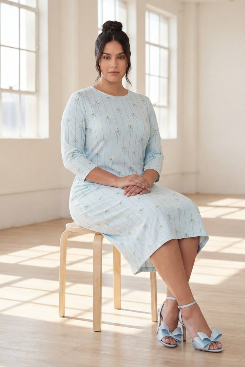 Model wearing Nuggles® The Original Midi Layering Dress in Sky Petal