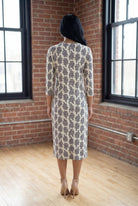 Model wearing Nuggles® Midi Layering Dress in Soft Fern