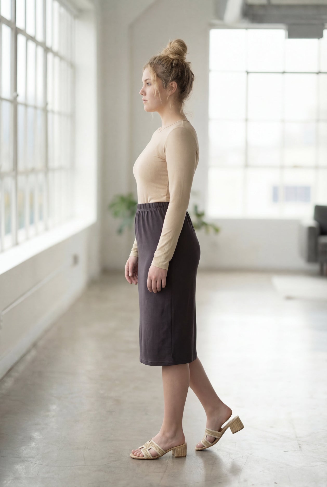 Model wearing Nuggles® 27" Classic Skirt  in Steel Gray